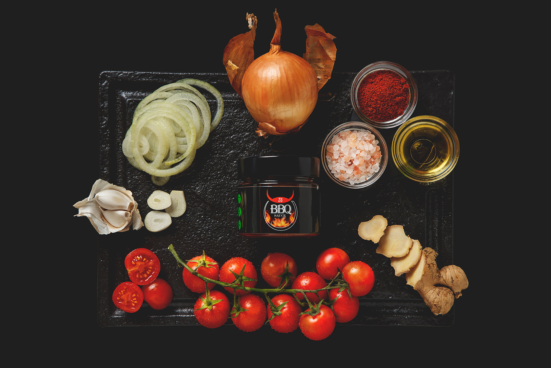 Zoes BBQ Sauce Black Background with ingredients